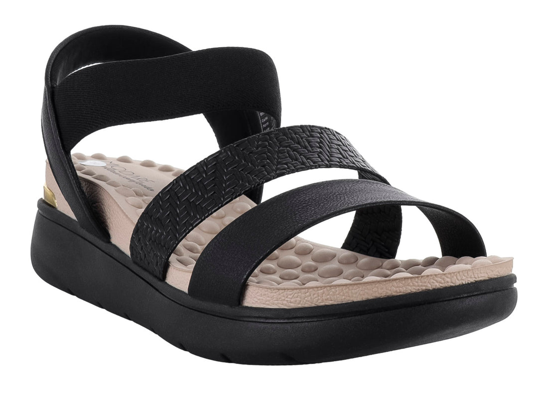 Sandalia de confort Modare color negro con tiras texturizadas y plantilla beige.