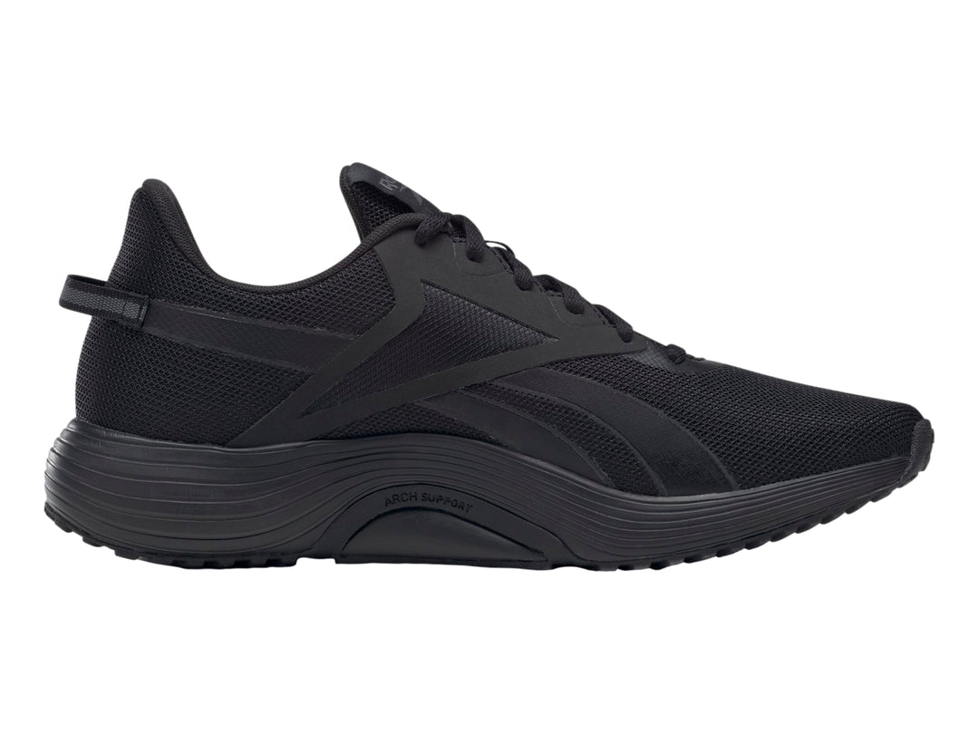 Tenis deportivos Reebok Lite Plus 3 en color negro, vista lateral.