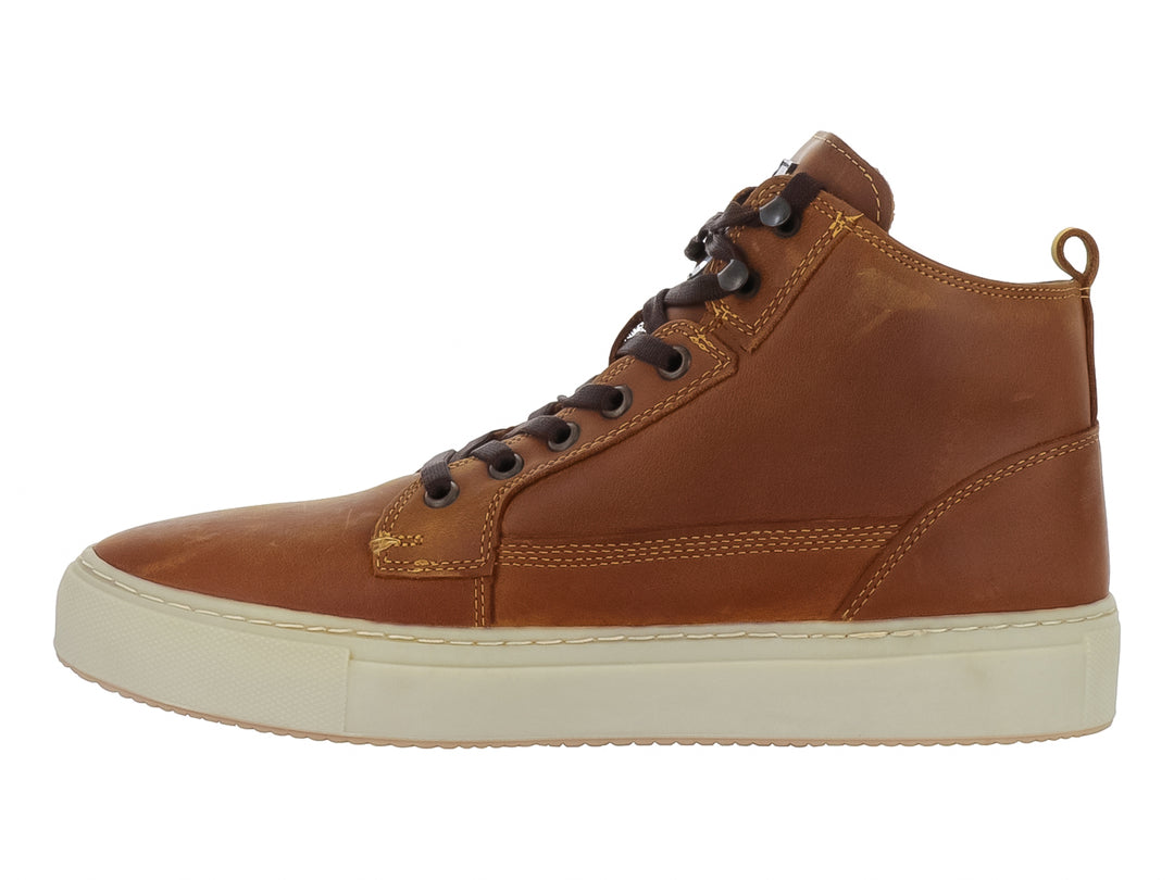 Botín Swissbrand de piel color camel con suela beige y cordones marrón oscuro.