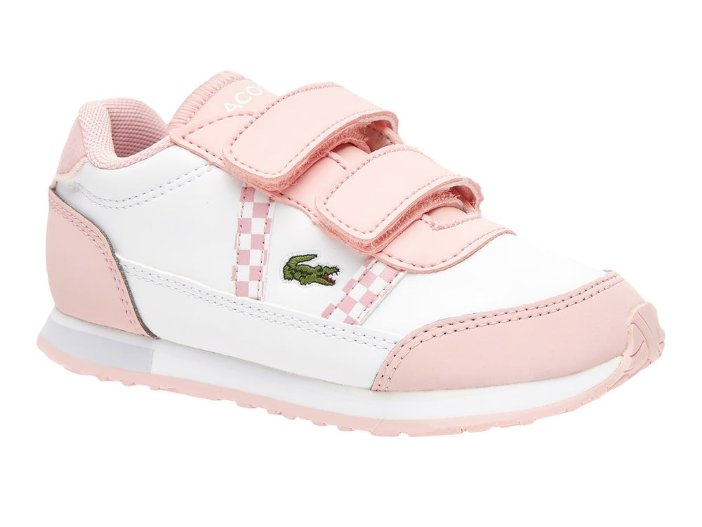 Tenis Lacoste blancos con detalles en rosa y cierres de velcro.