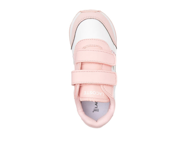 Tenis Lacoste blancos con detalles en rosa y cierres de velcro.