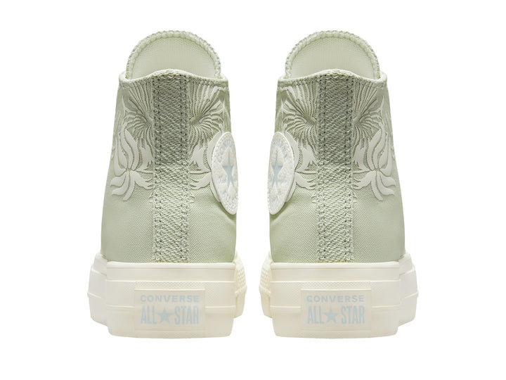 Tenis Converse Chuck Taylor All Star Lift Hi en color verde Summit Sage con plataforma blanca y detalles florales.