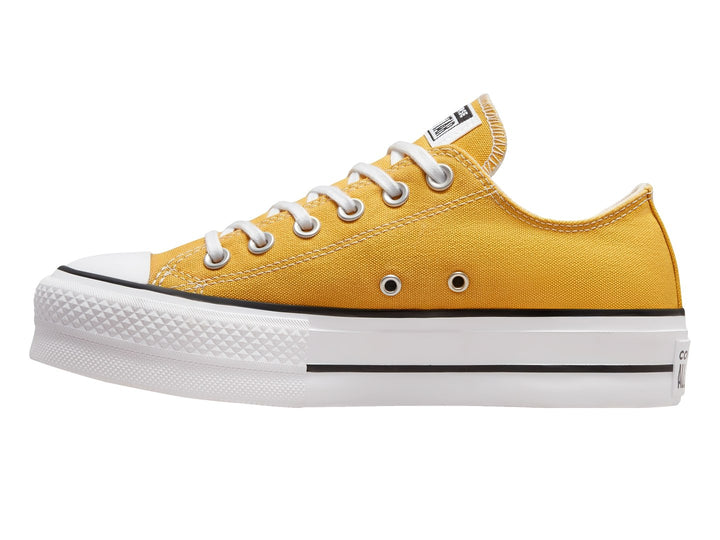Tenis Converse Chuck Taylor All Star Lift Ox en color amarillo con suela blanca de plataforma y detalles en negro.