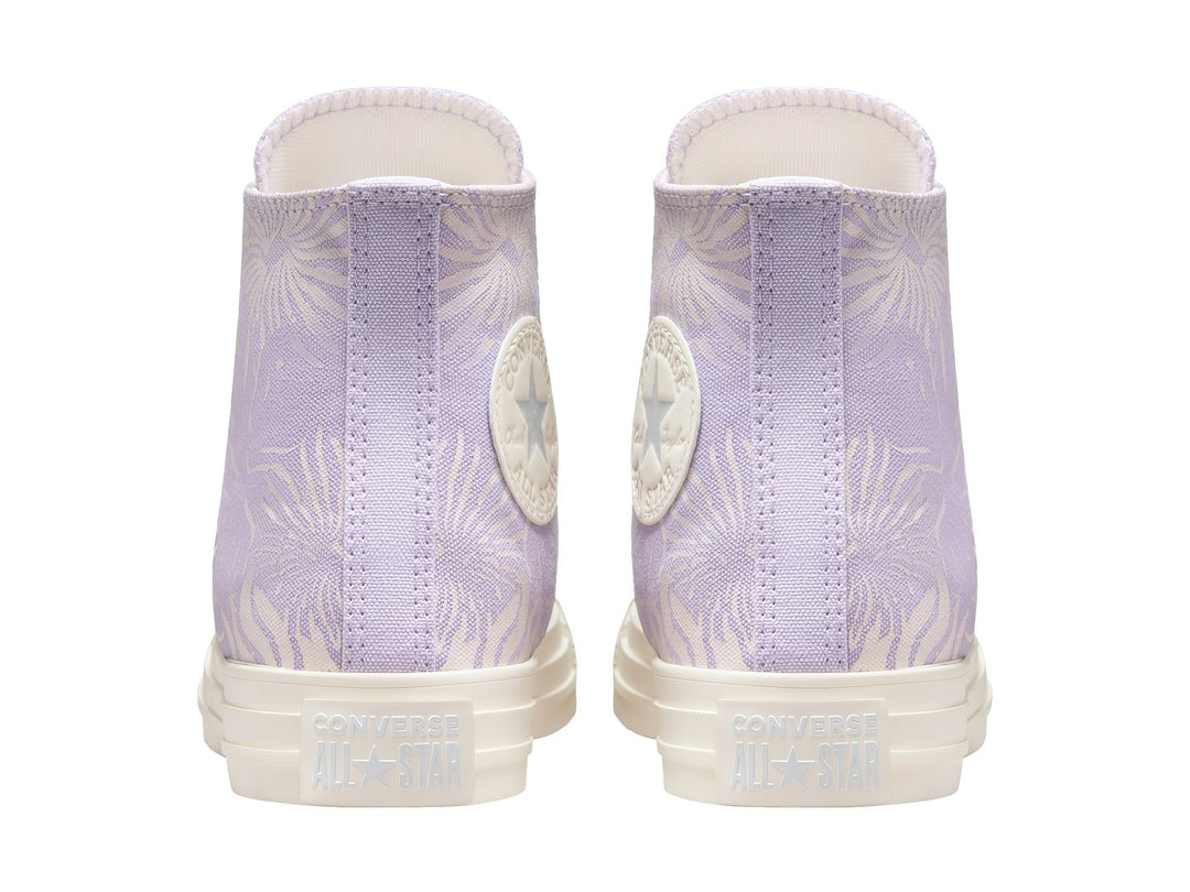 Tenis Converse Chuck Taylor All Star HI color morado con estampado floral y suela blanca.