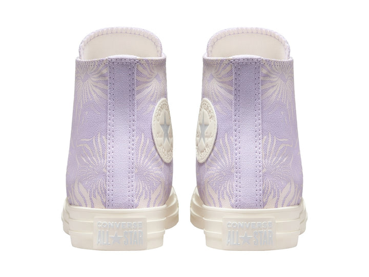 Tenis Converse Chuck Taylor All Star HI color morado con estampado floral y suela blanca.