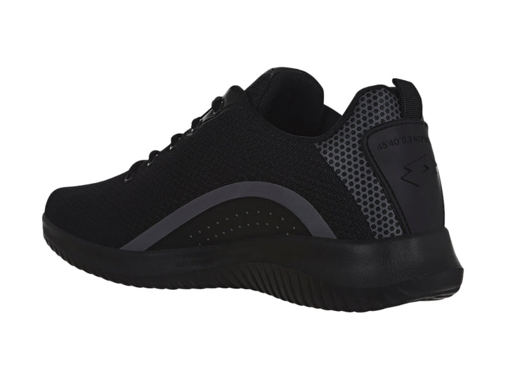 Tenis deportivos Lotto color negro con detalle lateral gris y suela negra.