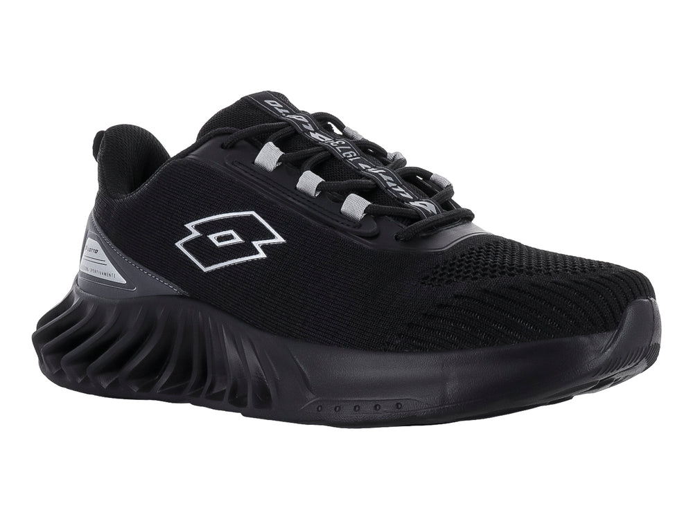 Tenis deportivo Lotto color negro con suela gruesa y texturizada.