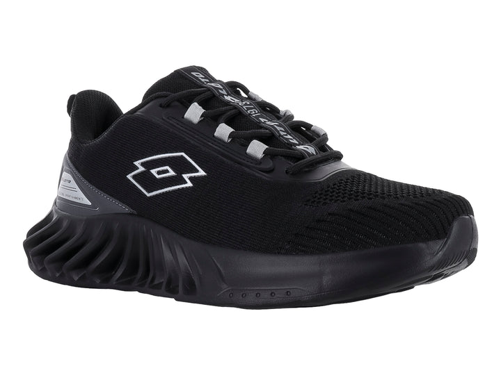 Tenis deportivo Lotto color negro con suela gruesa y texturizada.