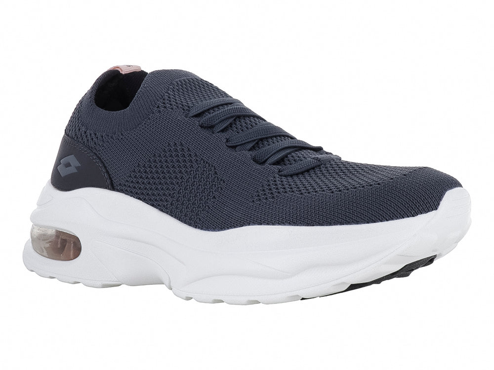 Tenis deportivos Lotto color Oxford con suela blanca ancha y cámara de aire en el talón.