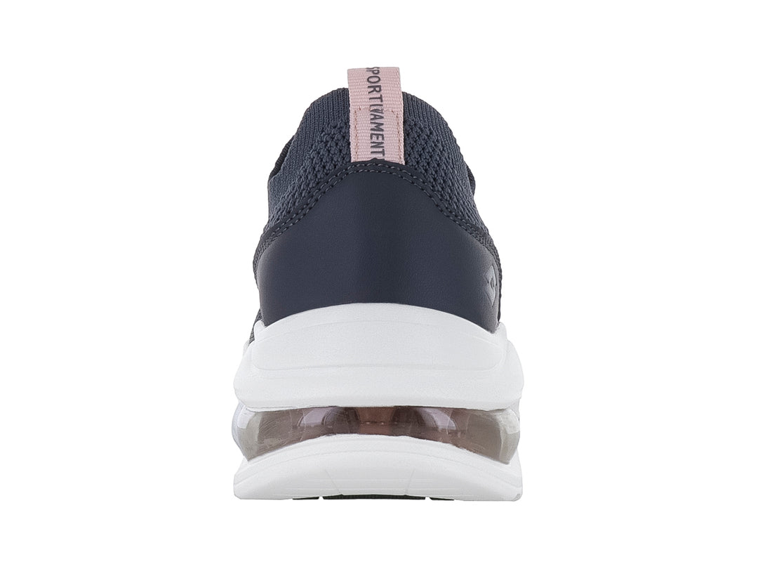 Tenis deportivos Lotto color Oxford con suela blanca ancha y cámara de aire en el talón.