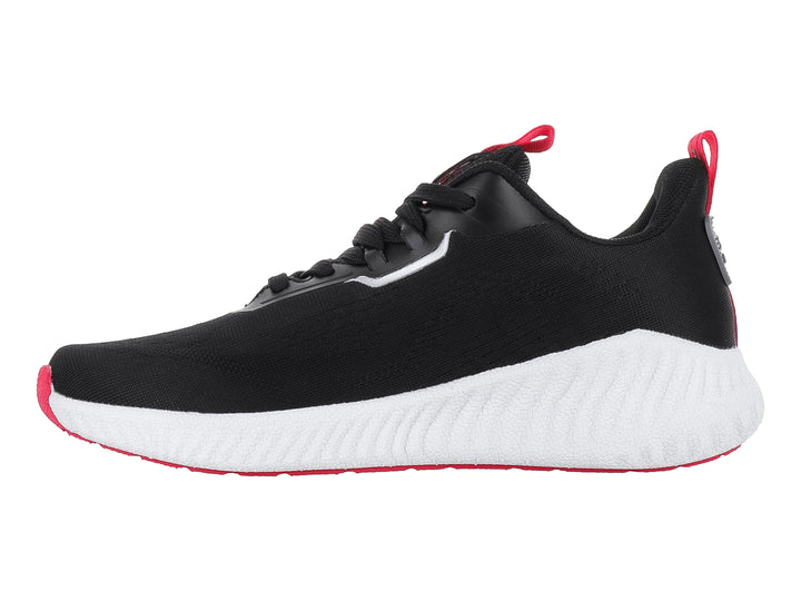 Tenis deportivos Lotto color negro con suela blanca y detalles en rosa.