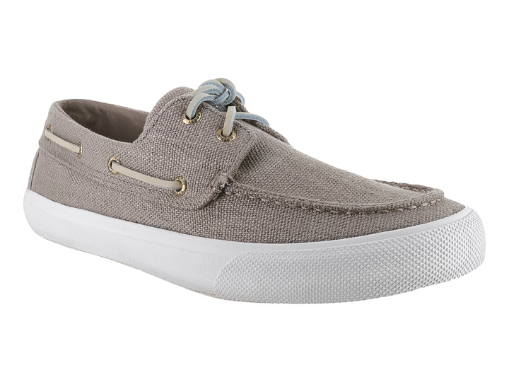 Zapato náutico Sperry color taupe con suela blanca y cordones azul claro.