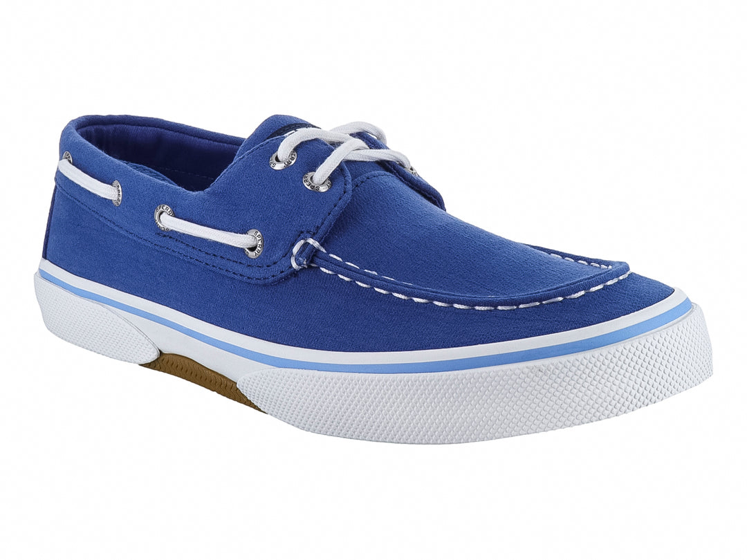 Zapato casual Sperry color azul marino con cordones y suela blanca, estilo náutico.