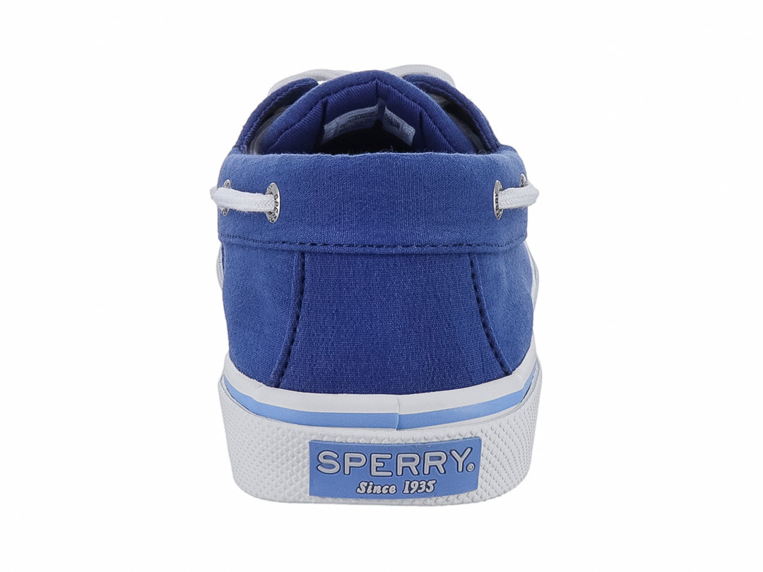 Zapato casual Sperry color azul marino con cordones y suela blanca, estilo náutico.