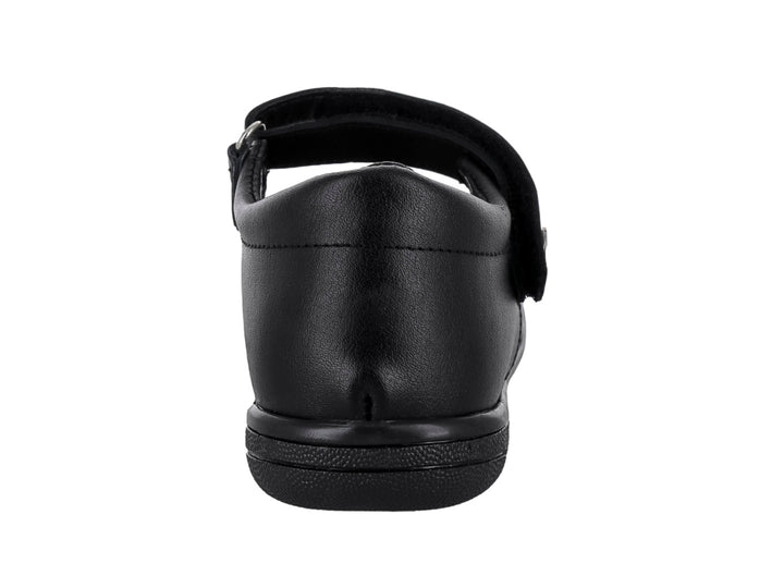 Zapato negro para niña estilo Mary Jane con correa de velcro y detalles perforados en el empeine.