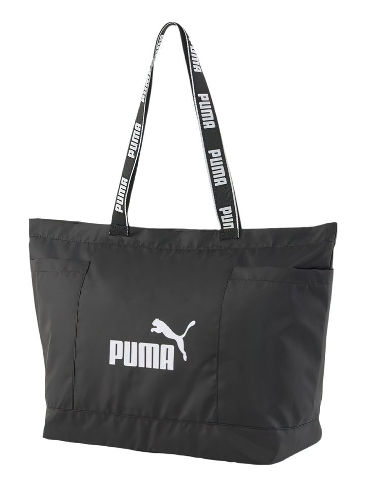 Bolsa de hombro PUMA Core Base Large Shopper en color negro con logotipo blanco frontal y asas con texto.
