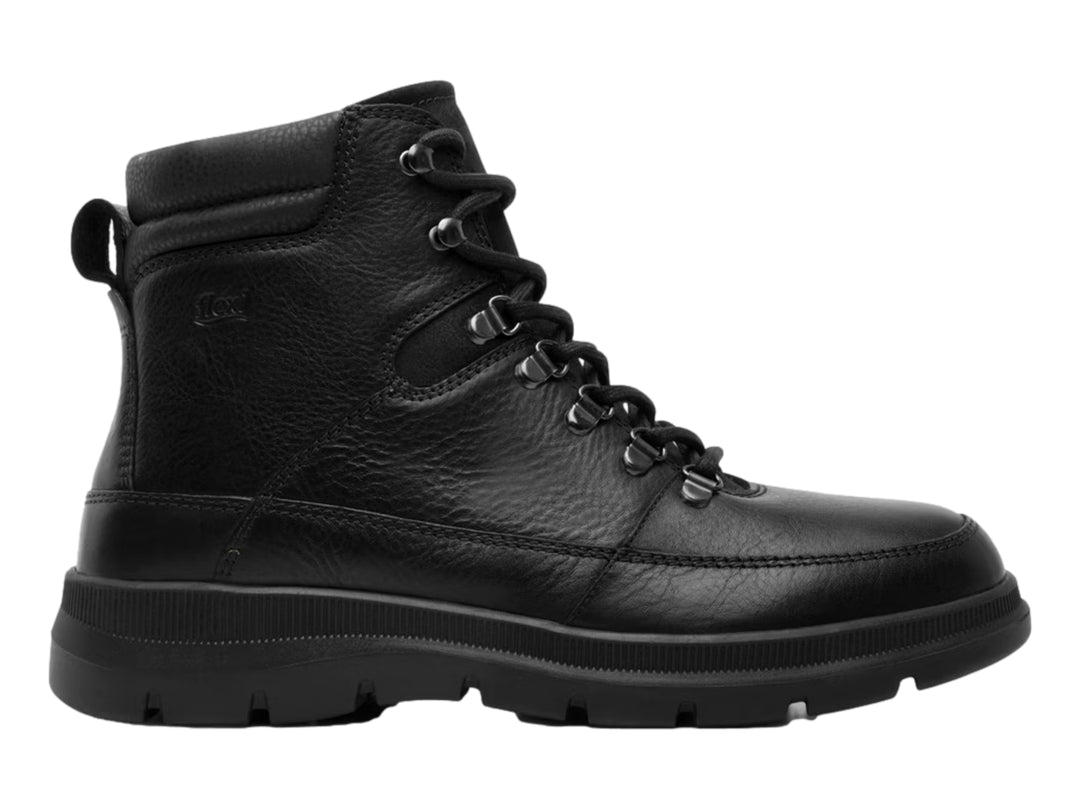 Bota negra de cuero marca Flexi con cordones y suela gruesa.