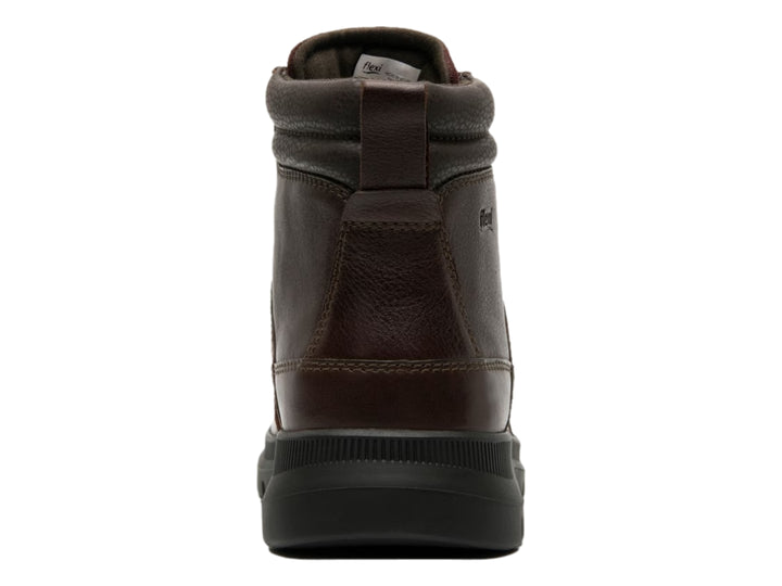 Bota casual Flexi de cuero color café oscuro con suela negra robusta y cordones.