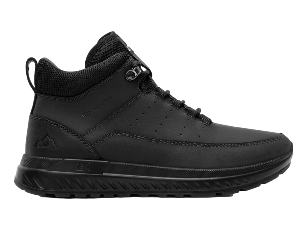 Zapato botín Flexi color negro con suela deportiva y textura mate.