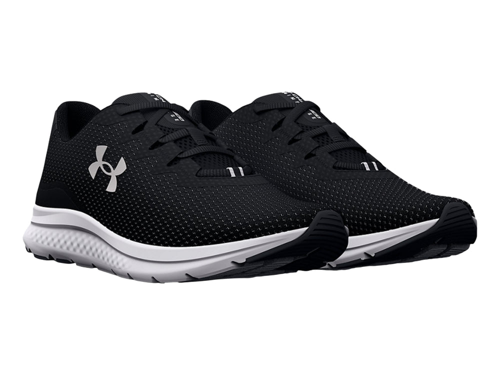 Tenis deportivos Under Armour Charged Impulse 3 en color negro con suela blanca y logo plateado lateral.