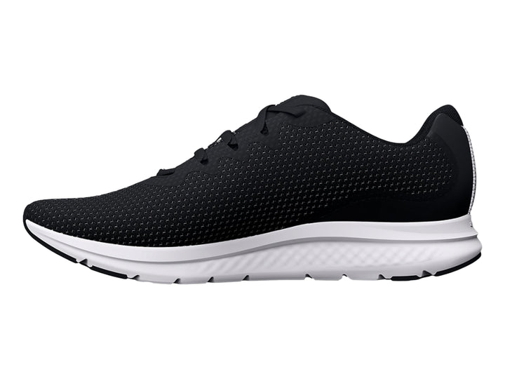 Tenis deportivos Under Armour Charged Impulse 3 en color negro con suela blanca y logo plateado lateral.