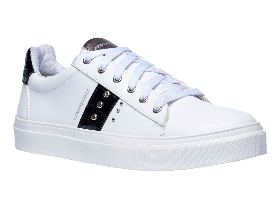 Tenis blancos Aeropostale con franja negra lateral y suela blanca de plataforma.