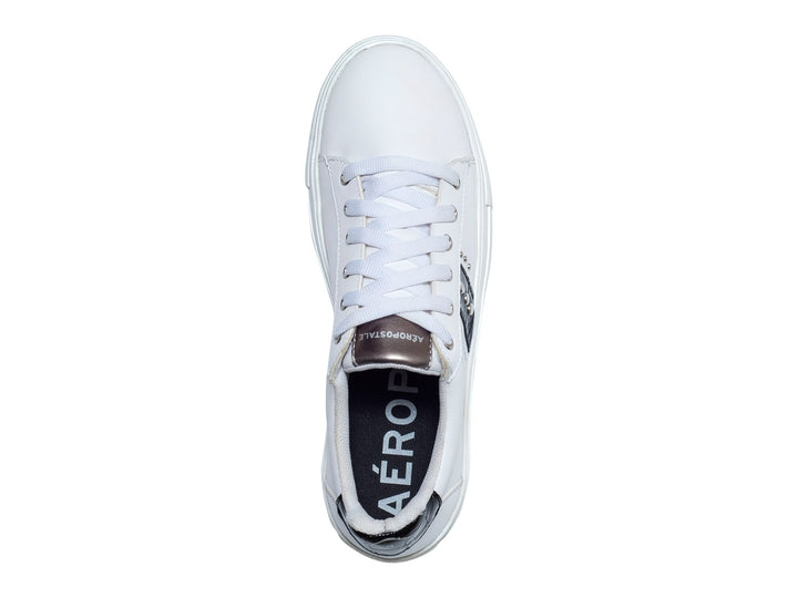 Tenis blancos Aeropostale con franja negra lateral y suela blanca de plataforma.