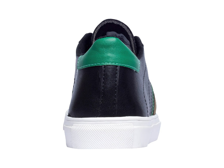 Tenis casuales Aeropostale color negro con suela blanca y detalles laterales en verde.