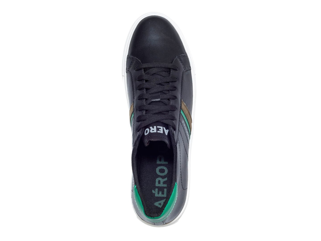 Tenis casuales Aeropostale color negro con suela blanca y detalles laterales en verde.