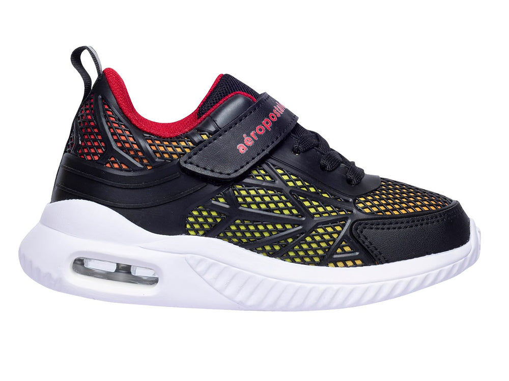 Tenis deportivos infantiles Aeropostale color negro con detalles en rojo y suela blanca.