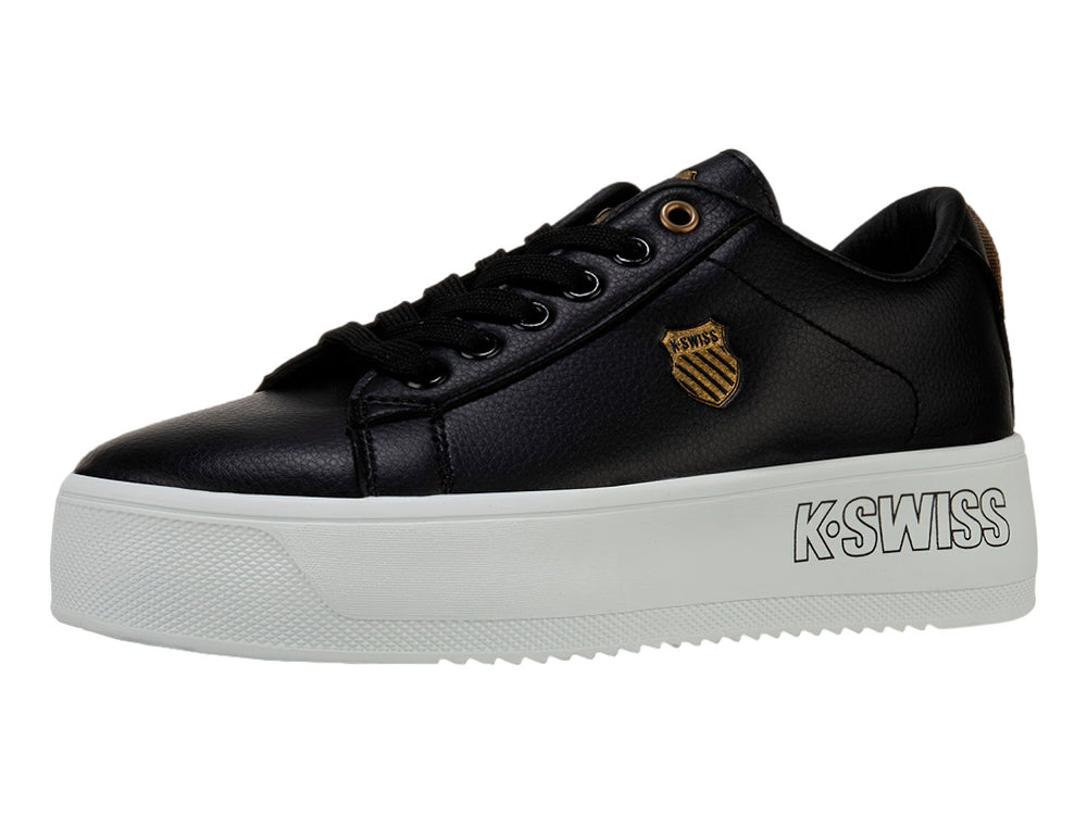 Tenis K-Swiss Trinity Platform en color negro con suela blanca ancha y plataforma.