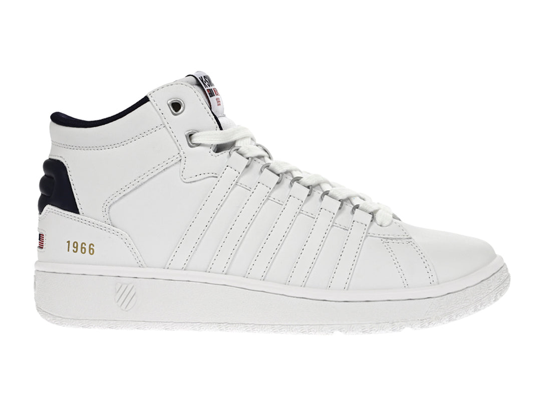 Tenis K-Swiss de media caña color blanco con detalles en azul marino.