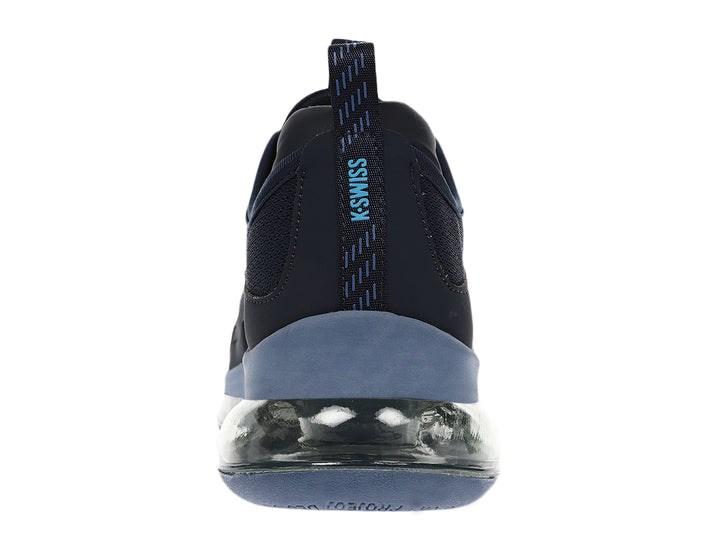 Tenis deportivos K-Swiss en color azul marino con suela gris y amortiguación visible.