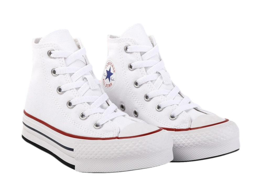 Tenis Converse Chuck Taylor All Star blancos de corte alto con suela EVA Lift y detalles en rojo y azul.