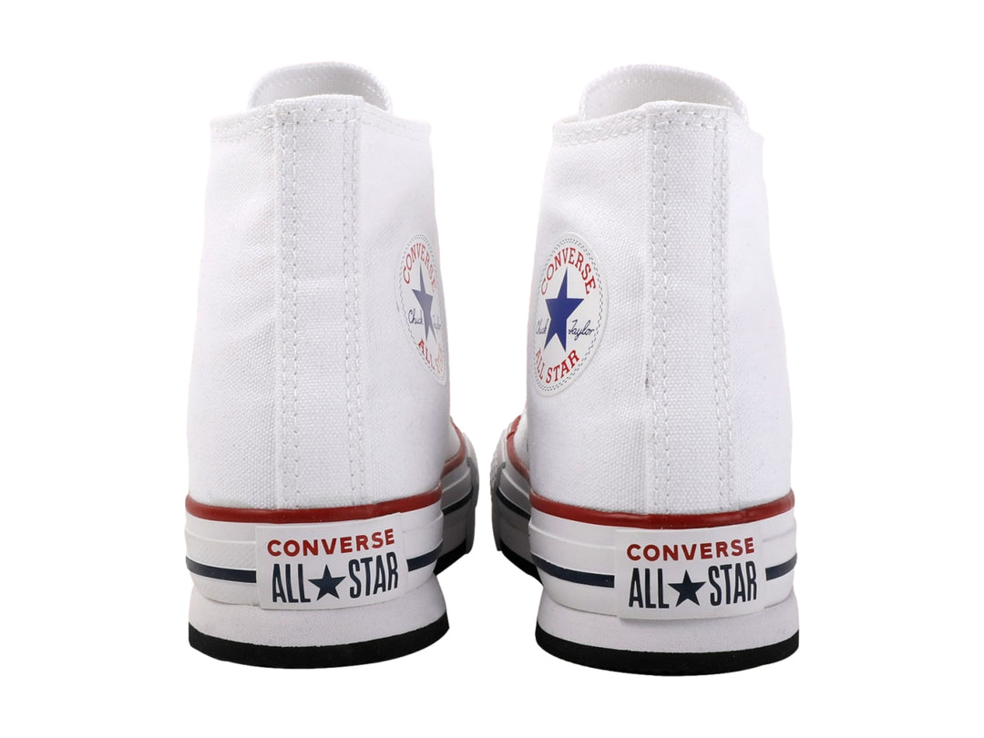 Tenis Converse Chuck Taylor All Star blancos de corte alto con suela EVA Lift y detalles en rojo y azul.