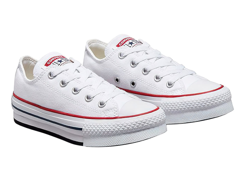 Tenis Converse Chuck Taylor All Star Eva Lift Ox en color blanco con franjas roja y azul en la suela.