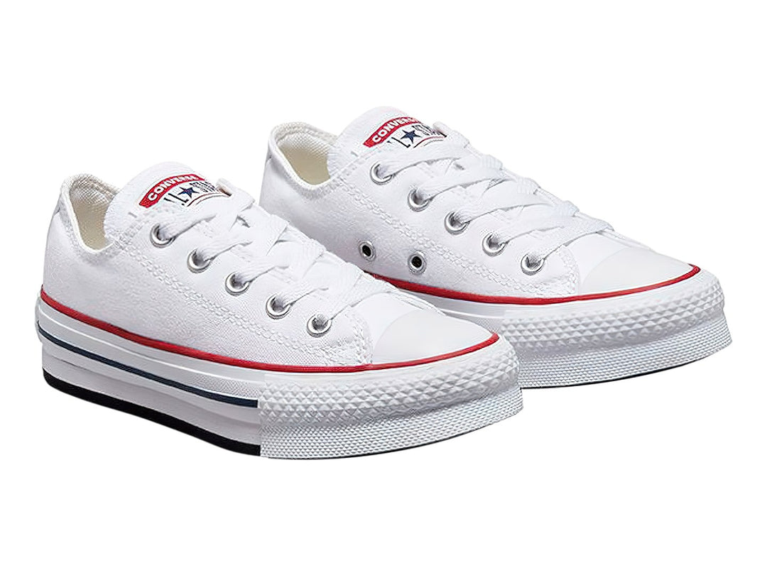 Tenis Converse Chuck Taylor All Star Eva Lift Ox en color blanco con franjas roja y azul en la suela.