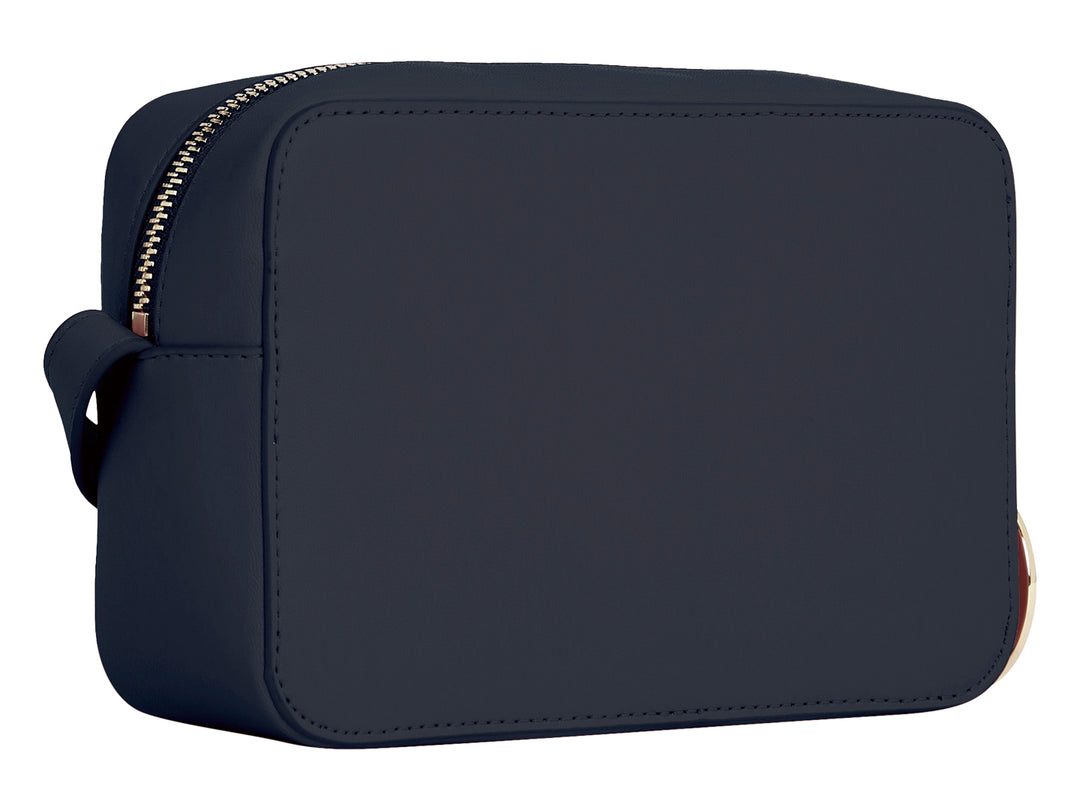 Bolso pequeño Tommy Hilfiger en color azul espacio con logotipo y detalles metálicos en dorado.