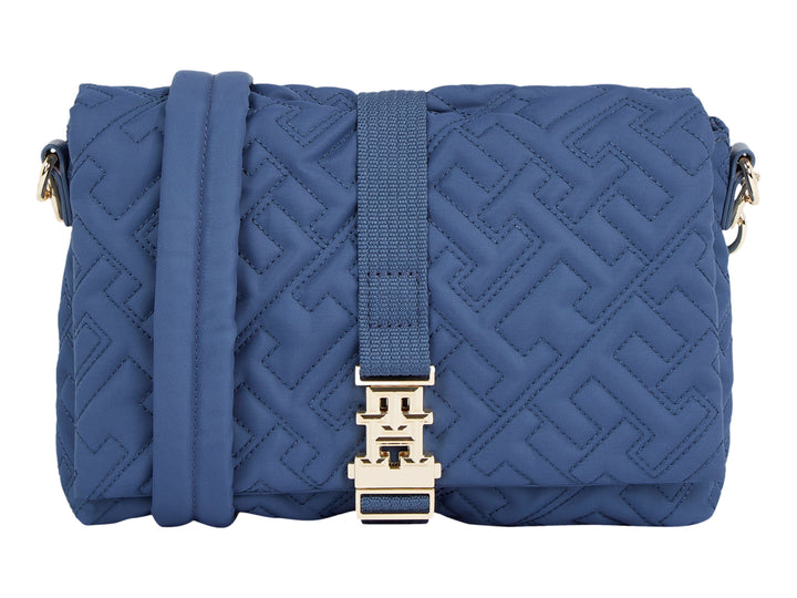 Bolso azul acolchado de Tommy Hilfiger con correa y herrajes dorados.