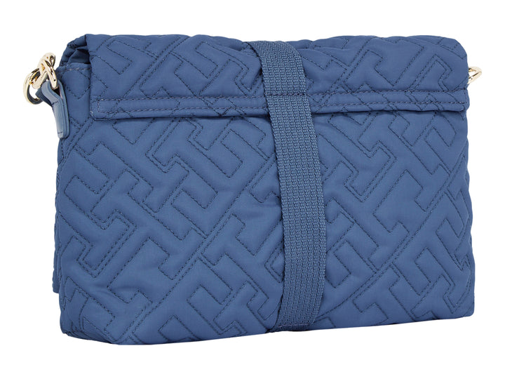 Bolso azul acolchado de Tommy Hilfiger con correa y herrajes dorados.