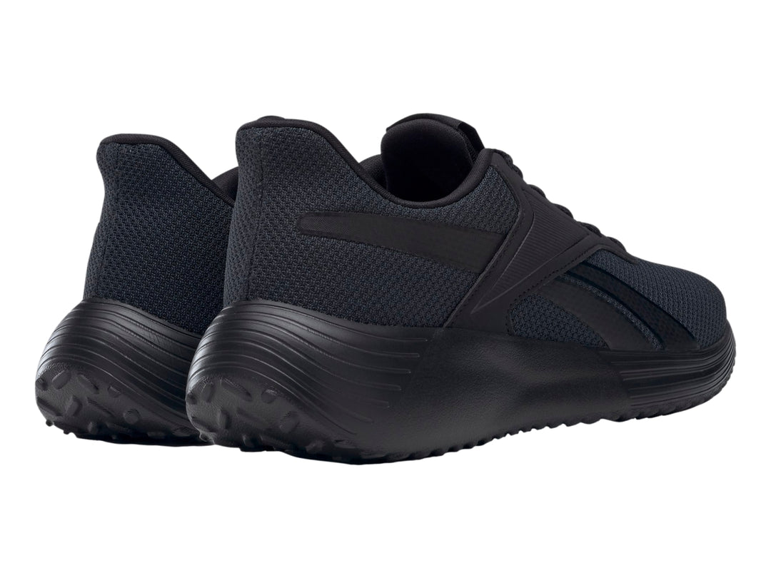 Tenis deportivos Reebok Lite 3.0 en color negro con suela ergonómica y parte superior de malla.