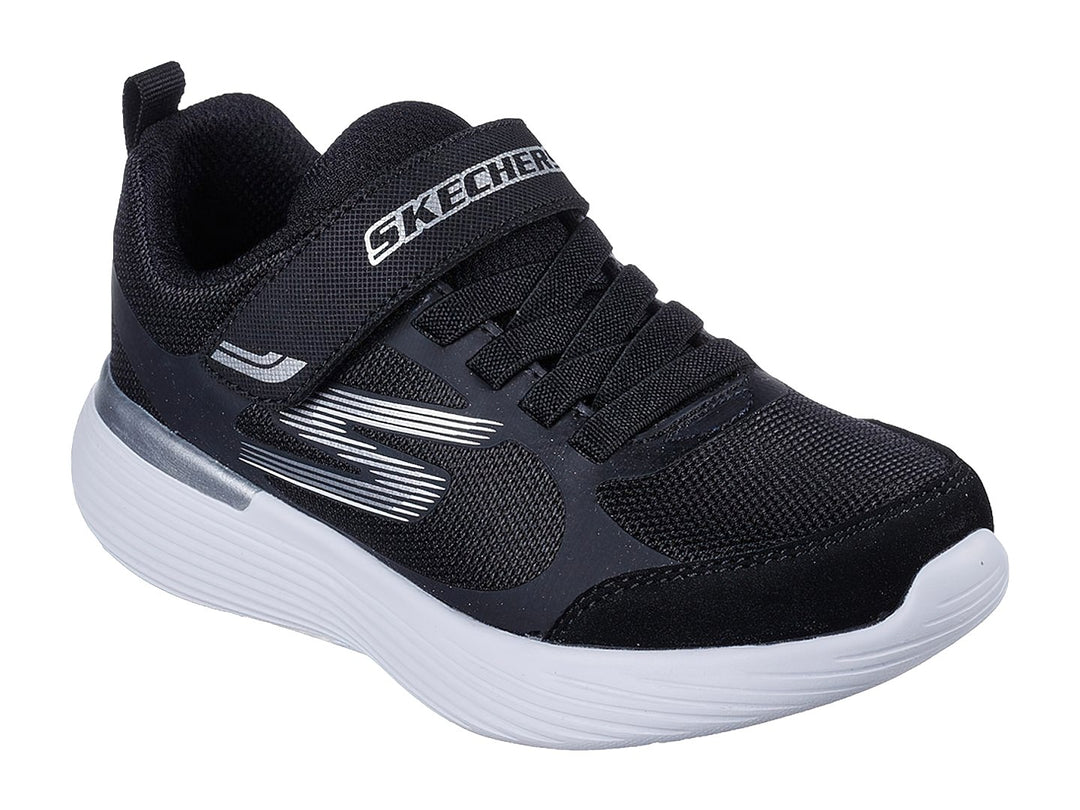 Tenis deportivos Skechers color negro con suela blanca y cierre de velcro para niño.