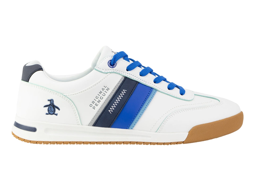 Tenis blancos Penguin con franjas azules y suela color miel.