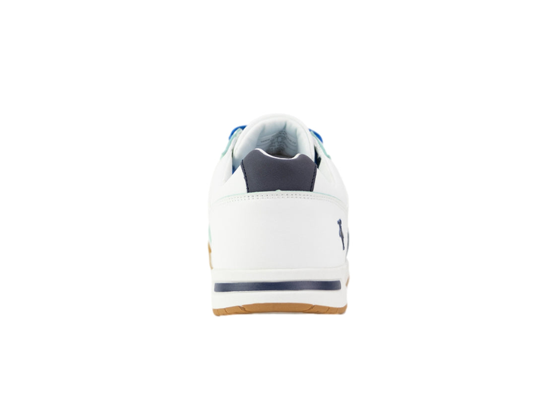 Tenis blancos Penguin con franjas azules y suela color miel.