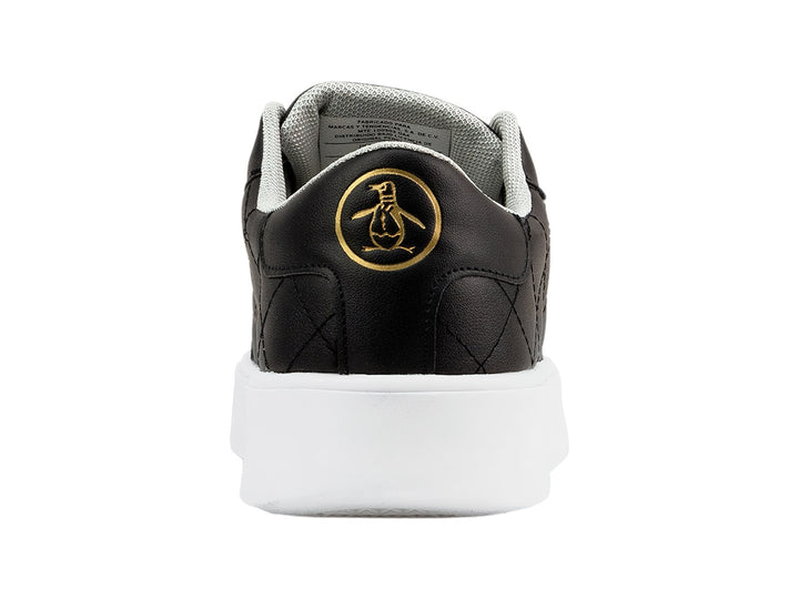 Tenis Penguin color negro con textura acolchada de rombos y suela blanca contrastante.