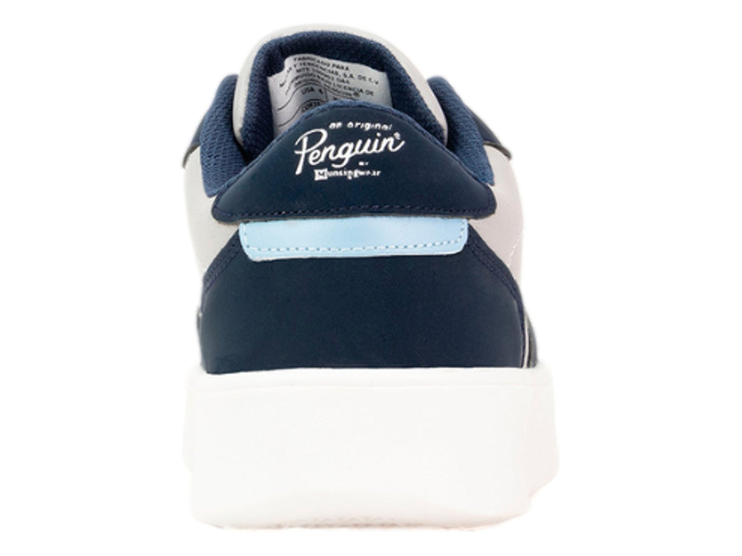 Tenis Penguin en colores azul marino y gris con suela blanca y cordones blancos.