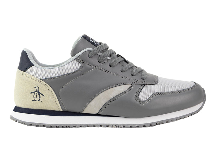 Tenis PENGUIN SEAN color gris con detalles en marino y beige, suela blanca y cordones grises.