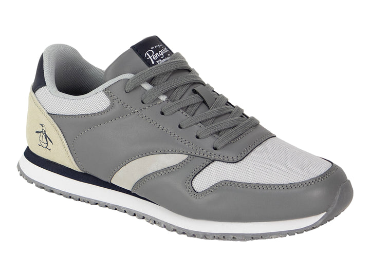 Tenis PENGUIN SEAN color gris con detalles en marino y beige, suela blanca y cordones grises.