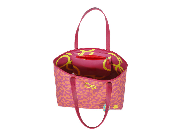 Bolso tote Cloe color magenta con estampado floral naranja y estuche coordinado.