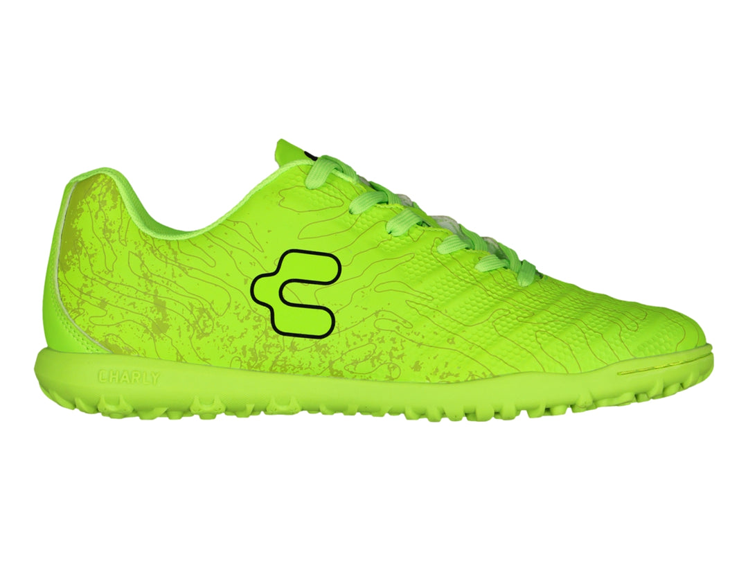 Zapato de fútbol Charly color limón con suela para césped sintético.